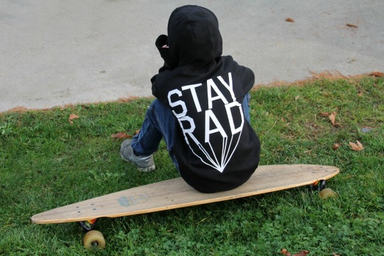 Fall Stay Rad sitting on board Silly Souls lifestyle